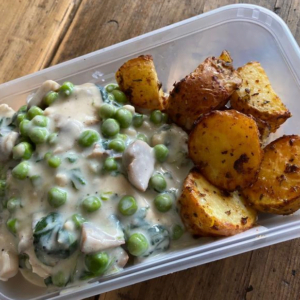 Roast Chicken in a Creamy Mushroom, Pea and Spinach Sauce Served with Roasties