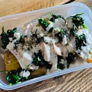 Chicken Breast Topped with Sautéed Kale & Peppercorn Sauce Served Over Herby Potatoes