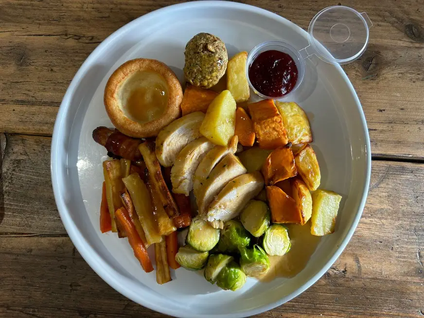 Christmas festive dinner, reimagined for health but still full of holiday cheer. Golden Yorkshire pudding, sweet honey-glazed root vegetables, Brussell sprouts, pig in a blanket. Savoury stuffing rounds out the meal delivering all the comfort you crave. This festive meal prep is a delicious balance of tradition and healthy indulgence, perfect for the holiday season!