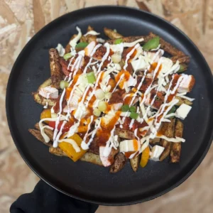 Piri Piri Chicken & Halloumi Loaded Fries with 33.8g protein. Smoky, spicy fake-away comfort food with balanced macros.