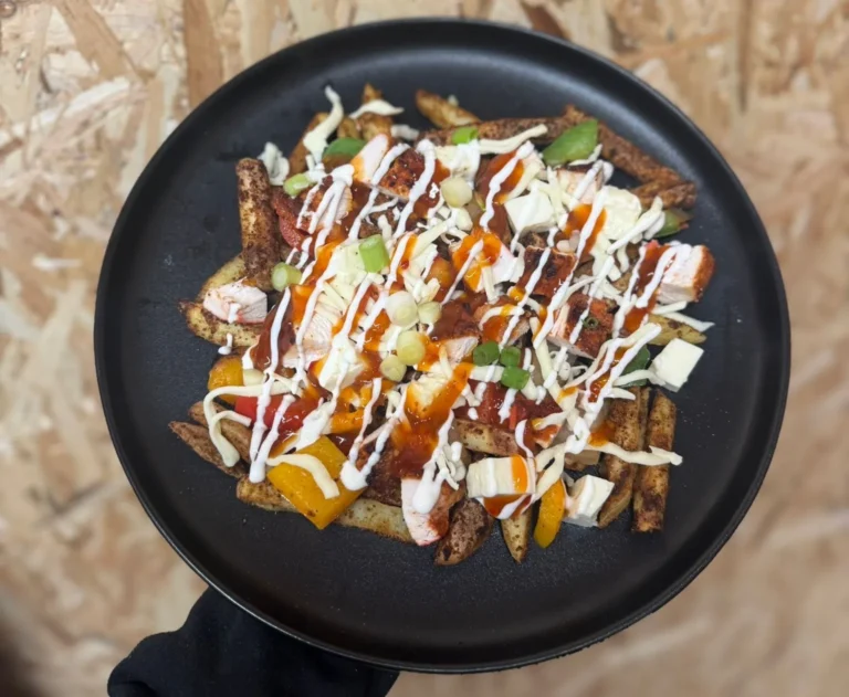 Piri Piri Chicken & Halloumi Loaded Fries with 33.8g protein. Smoky, spicy fake-away comfort food with balanced macros.