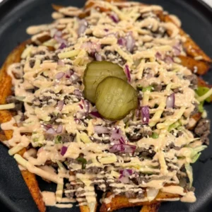 Big Mac Loaded Fries with beef mince, cheddar, lettuce, gherkins and tomato sauce